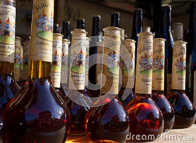 Bottles of magic potion lightened by natural sunlight . Editorial Stock Photo