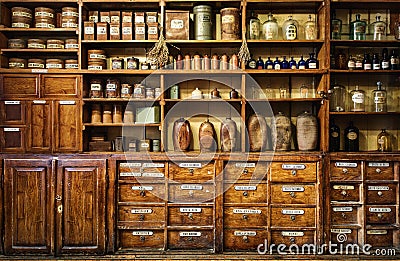 Bottles on the shelf in old pharmacy. Stock Photo