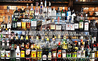 Bottles of spirits and liquor at the bar Editorial Stock Photo