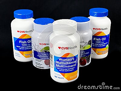 Bottles of Various CVSHealth Vitamins and Supplements for Good Health Editorial Stock Photo