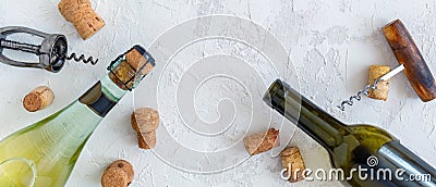 Bottles, wine stoppers and vintage corkscrews. Stock Photo