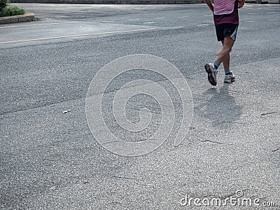 The bottom of the runners who jogging in the park Stock Photo