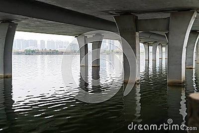 Bottom shot of the large bridge on the sea Stock Photo