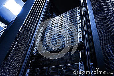 Bottom view Array disk storage in data center with depth of field in cool tone. Point of view Stock Photo