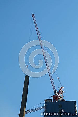 Crane on underconstruction site condomenium in building concept Stock Photo