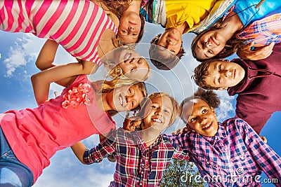 Bottom view of kids group standing in round shape Stock Photo