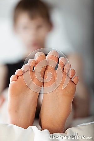 Bottom view on pair of feet Stock Photo