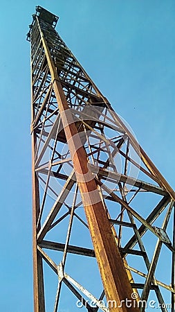 Bottom view of the railway searchlight against a blue sky. Stock Photo