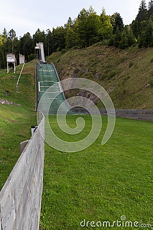 Ski jumping slope and tracks on summer Editorial Stock Photo