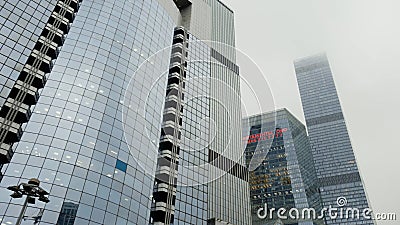 Bottom view of various international business centers, modern architecture. Action. Skyscrapers in Financial District of Editorial Stock Photo