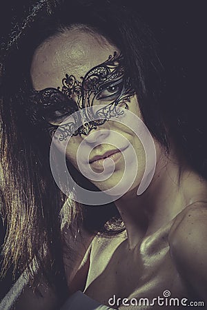 Boudoir, sensual masked woman, venetian mask, brunette young Stock Photo