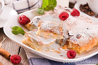 Bougatsa - Greek puff pastry with cream. Stock Photo