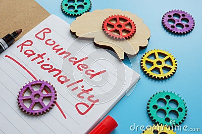 Bounded rationality inscription and colorful cog wheels. Stock Photo