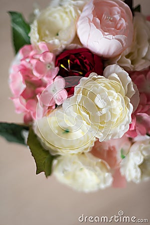 Bouquet of artificial peonies close-up. All shades of pink Stock Photo