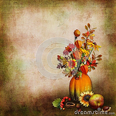 Bouquet of autumn leaves and flowers in a vase from a pumpkin on an isolated background Stock Photo