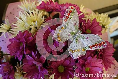 Bouquet with a beaded brooch in the shape of a butterfly Stock Photo