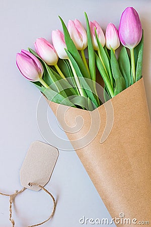 Bouquet of beautiful pink and purple fresh tulips Stock Photo