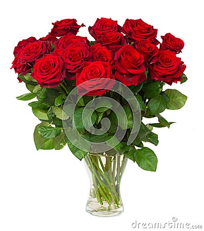 Bouquet of blossoming dark red roses in vase Stock Photo