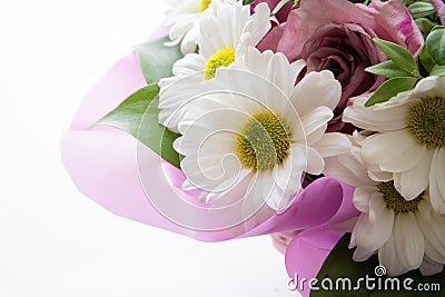 Bouquet of daisies on a white background close-up. Valentine`s Day Gift Stock Photo