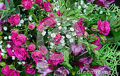 Bouquet of flowers. an attractively arranged bunch of flowers, especially one presented as a gift or carried at a ceremony. nose Stock Photo