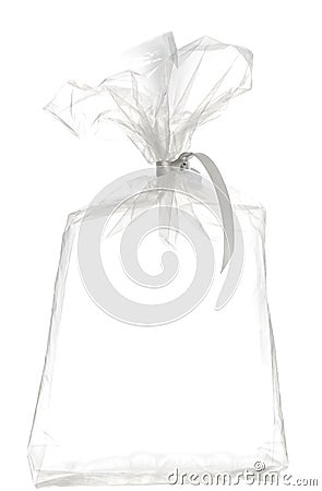 A bouquet of flowers from soap, a vase and a toy in a transparent packaging bag Stock Photo