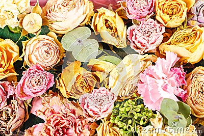 A bouquet of flowers on top. Closeup. Multi-colored roses Stock Photo