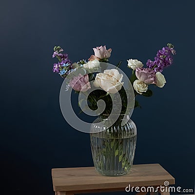 Bouquet of hackelia velutina, purple and white roses, Stock Photo