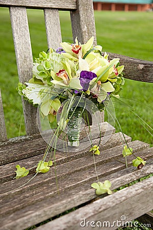 Bouquet on park bench Stock Photo
