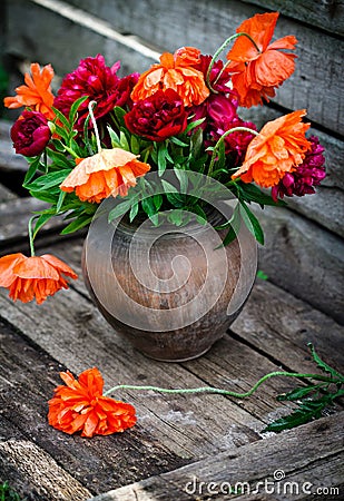 Bouquet of peonies and poppies Stock Photo