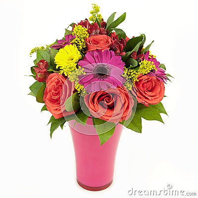 Bouquet of pink and yellow flowers in vase isolated on white Stock Photo