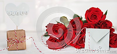 Bouquet of red roses with a message of love Stock Photo
