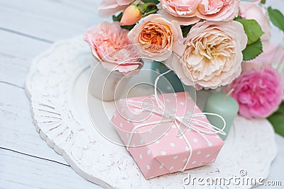 Bouquet of roses and gift Stock Photo