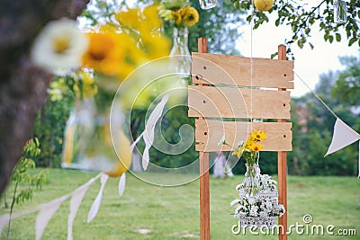 Bouquet of sunflowers. Original wedding floral decoration in the form of mini-vases Stock Photo