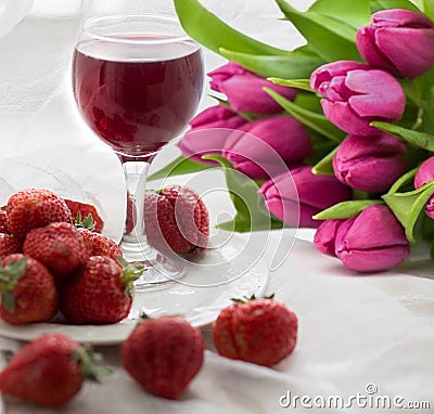 Bouquet of tulips, strawberry and wine Stock Photo