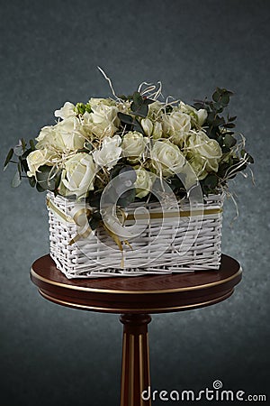 Bouquet with white roses and decorative straw Stock Photo