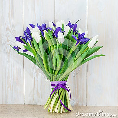 Bouquet of white tulips and blue irises Stock Photo