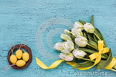 Bouquet of white tulips and decorative Easter eggs. Easter background, Stock Photo