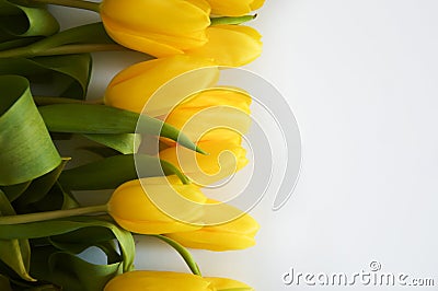 A bouquet of yellow tulips. beautiful spring flowers. background for decoration for the Easter holida Stock Photo