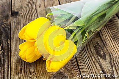 Bouquet of yellow tulips in packing Stock Photo