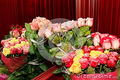 Bouquets of fresh roses reflected in the mirror Stock Photo
