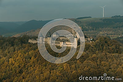 Bourscheid castle with autumn colors, cloudy day Stock Photo