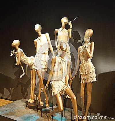 Boutique display window with mannequins. Stock Photo