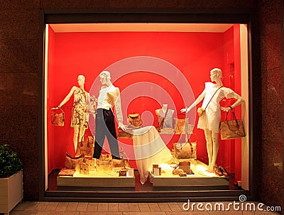 Boutique display window with mannequins in fashionable dresses Editorial Stock Photo