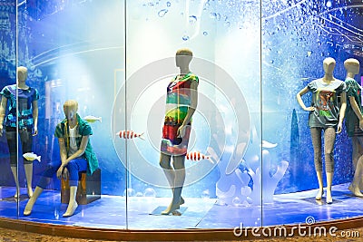 Boutique window of fashion clothing store Stock Photo