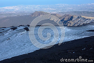 Valley, volcanic ridge and Ionian coast from Etna Park, Sicily Stock Photo