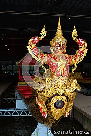 Bow sculpture antique barge of king Rama IX `Krut Hern Het` in the Museum of the Royal Barges. Bangkok, Thailand Editorial Stock Photo