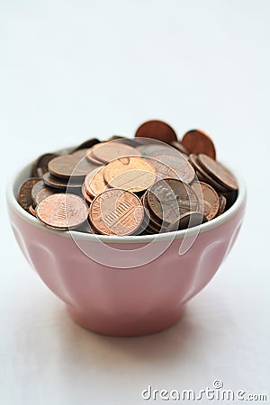 Bowl with American cents Stock Photo