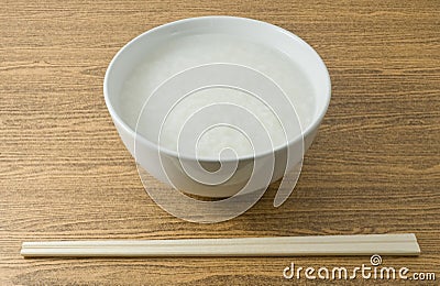 Bowl of Asian Boiled Rice or Rice Porridge Stock Photo