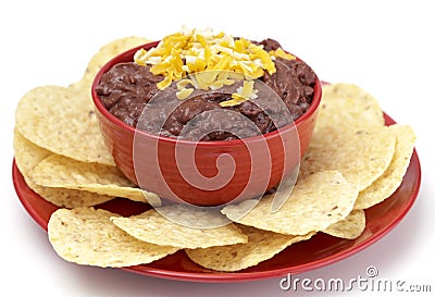 Bowl of Black Bean Dip with Chips on a White Background Stock Photo