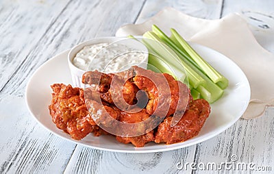 Bowl of buffalo wings with blue cheese dip Stock Photo